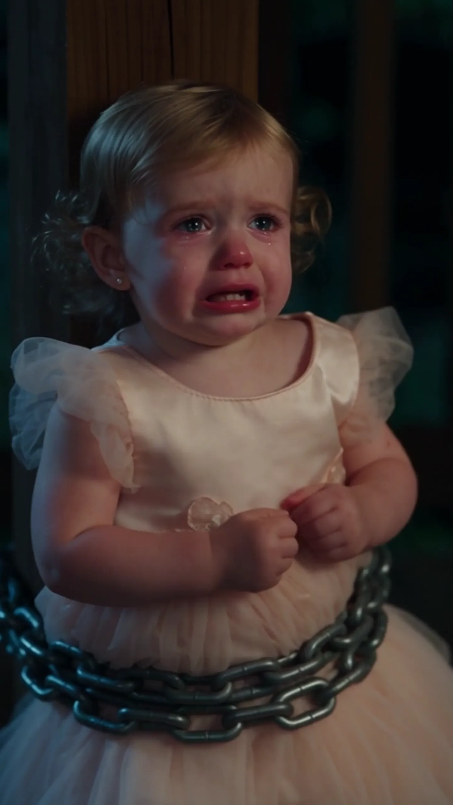 At my daughter’s 5th birthday party, I found her chained to a porch post while her father stood inside celebrating.