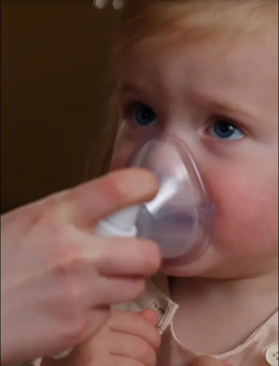 Ophelia violently snatches Lucy’s inhaler from her hand and throws it beneath a heavy cabinet.